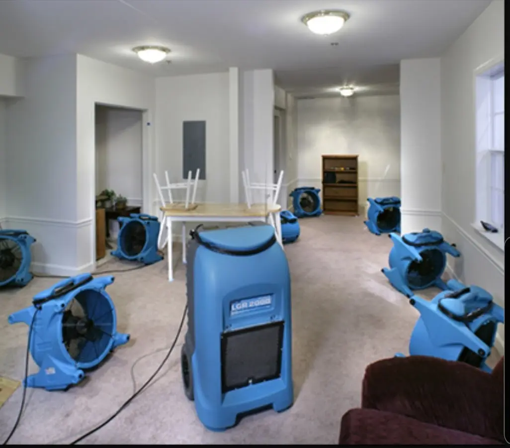 Air movers and dehumidifier setup for Water Extraction & Removal in Red Oak